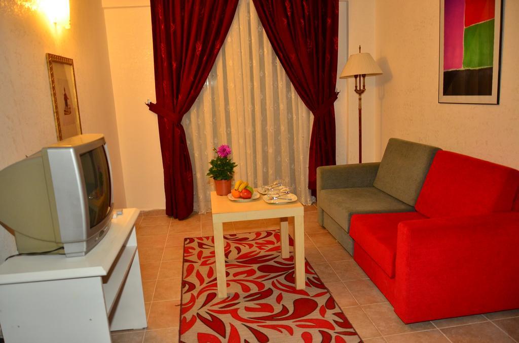 Almila Side Suite Hotel Стая снимка